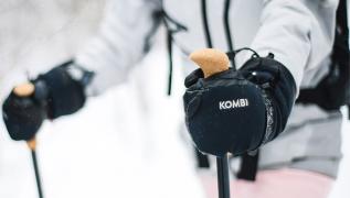 Skier wearing Kombi gloves